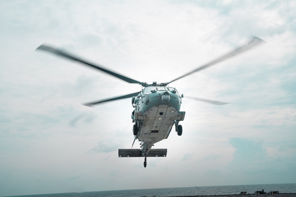 Sailors Conduct Cargo Transfer Aboard USS Harpers Ferry