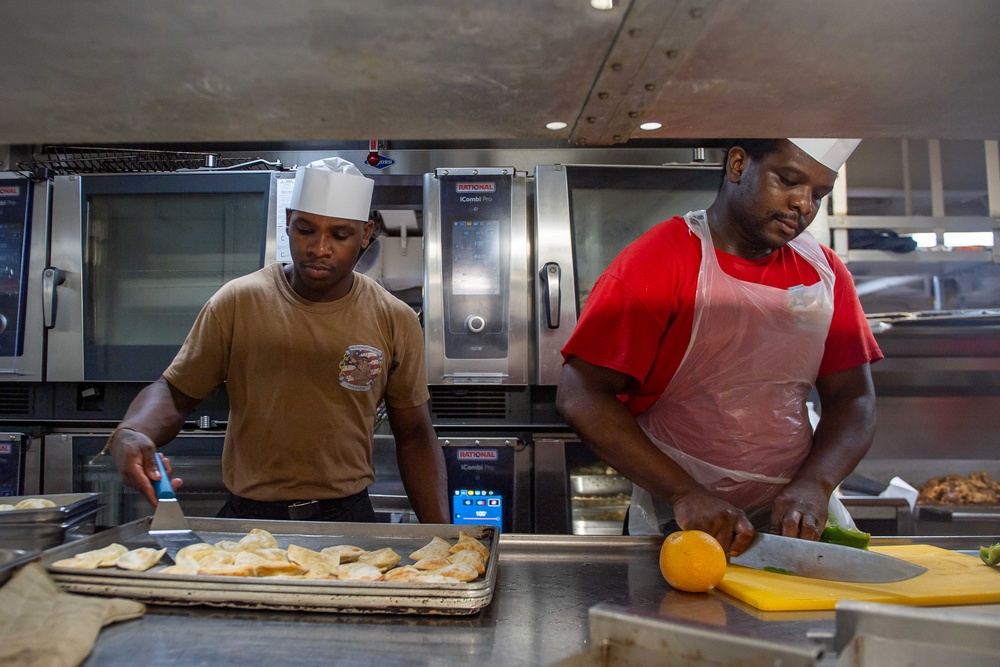 Culinary Specialists of USS Theodore Roosevelt Prepare Meals