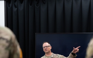 Command Sergeant Major Tully J. Culp briefs soldiers of the 139th Medical Brigade headquarters and headquarters company at Fort Knox, Kentucky July 25, 2024