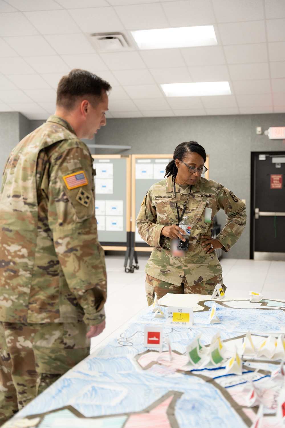 Sergeant Samuel Morrison briefs Deputy Commanding General Cindy M. Saladin-Muhammad at Fort Knox, Kentucky July 25, 2024