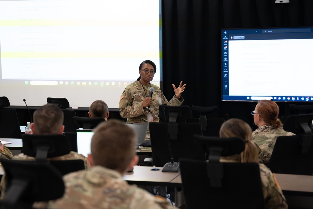 Deputy Commanding General Cindy M. Saladin-Muhammad briefs soldiers of the 139th Medical Brigade Headquarters and Headquarters company at Fort Knox, Kentucky July 25, 2024