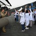 Military members talk with visiting rocketeer teams during FIA 2024