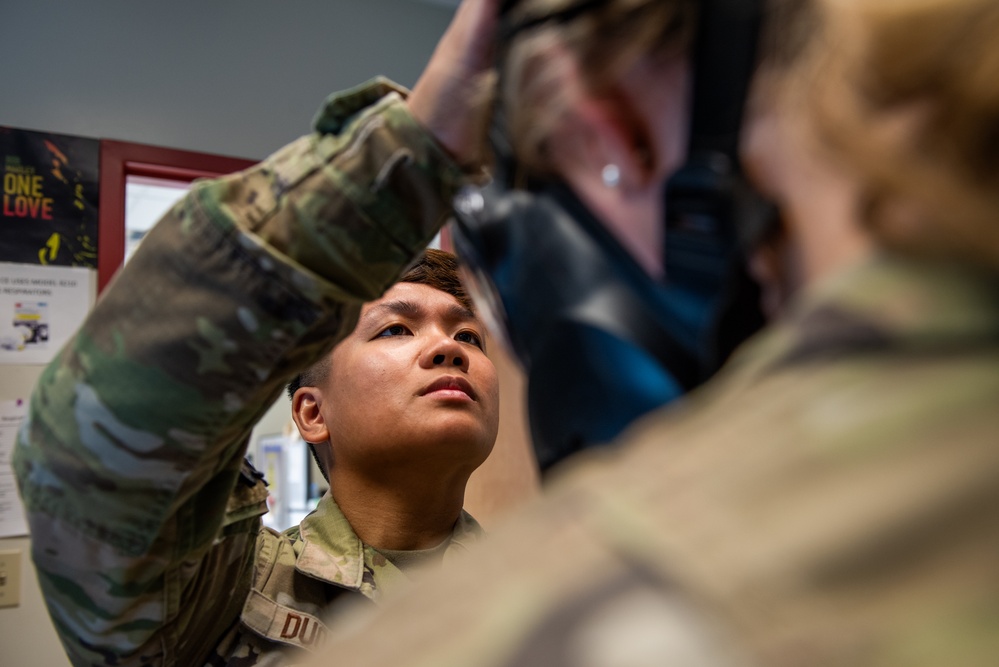 60th OMRS bioenvironmental engineering performs gas mask fit testing