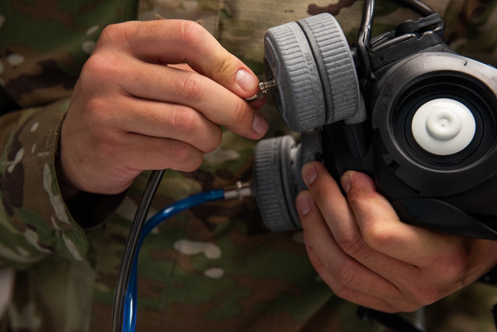 60th OMRS bioenvironmental engineering performs gas mask fit testing