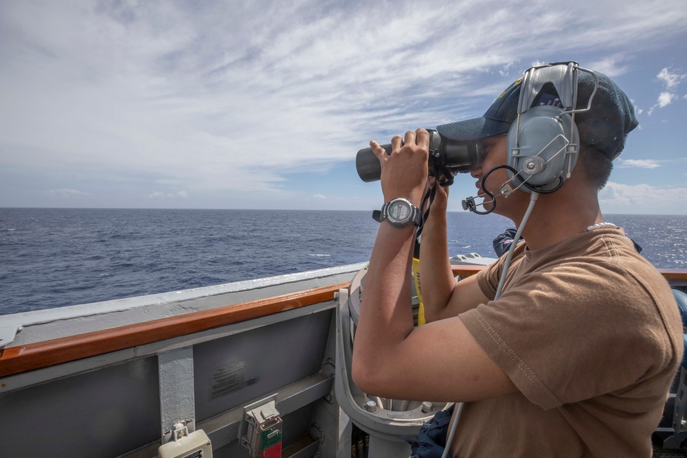 USS Spruance Sailor stands watch