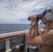 USS Spruance Sailor stands watch