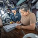 USS Spruance Sailors stands watch