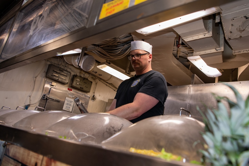 Nimitz Sailor Serves Breakfast