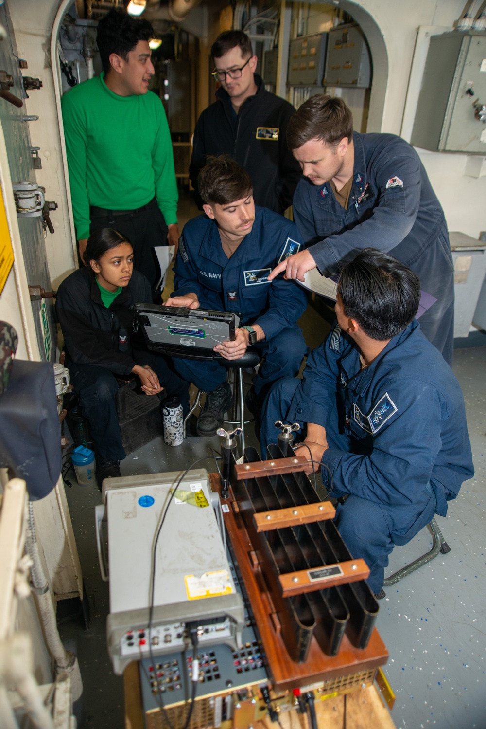 Nimitz Sailors Calibrate Power Supply Component