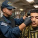 A Nimitz Sailor Cuts Hair