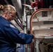 Nimitz Sailors Perform Maintenance On A Scuttle