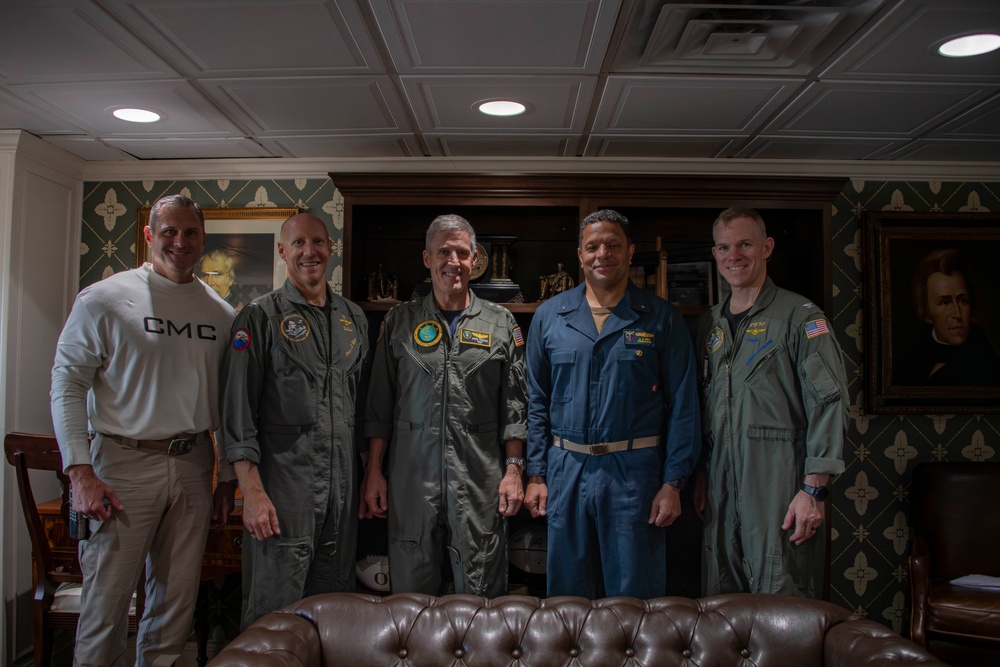 Adm. Steve Koehler tours the USO aboard Abraham Lincoln