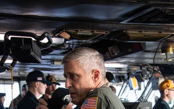 Adm. Steve Koehler tours the USO aboard Abraham Lincoln