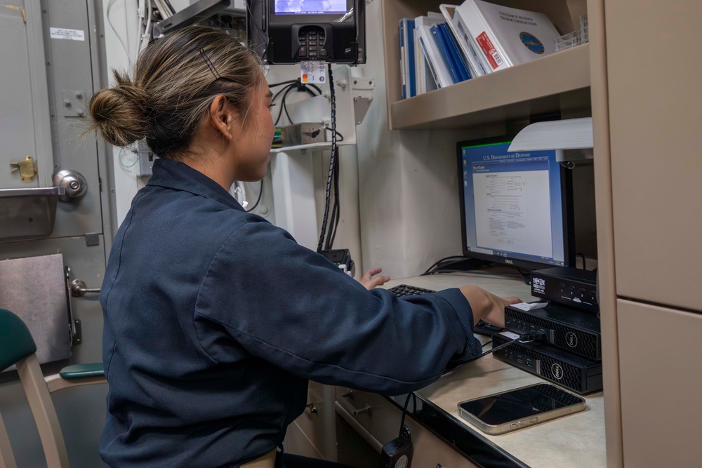 USS Spruance Sailor performs duty