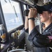 USS Spruance Sailor stands watch