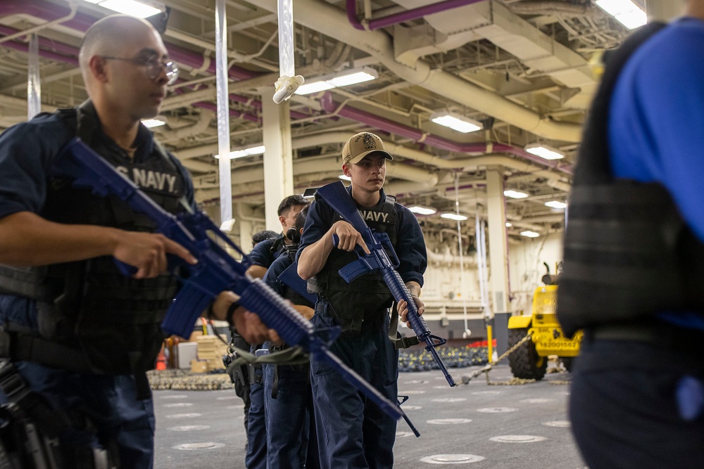 USS Tripoli Sailors practice tactical manuvers