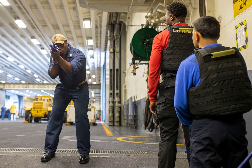 USS Tripoli Sailors practice tactical manuvers
