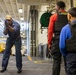 USS Tripoli Sailors practice tactical manuvers