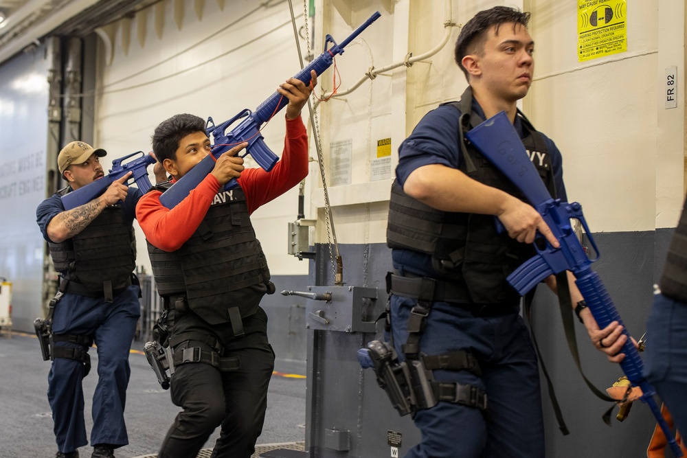 USS Tripoli Sailors practice tactical manuvers