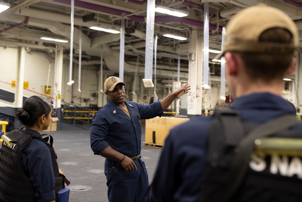 USS Tripoli Sailors practice tactical manuvers
