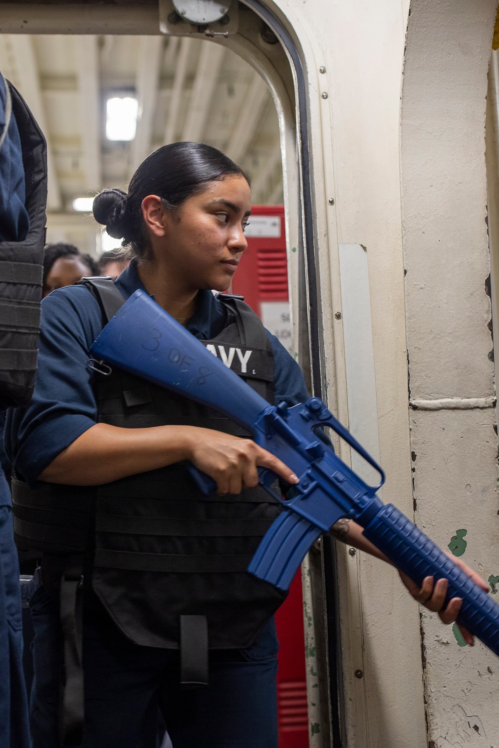 USS Tripoli Sailors practice tactical manuvers
