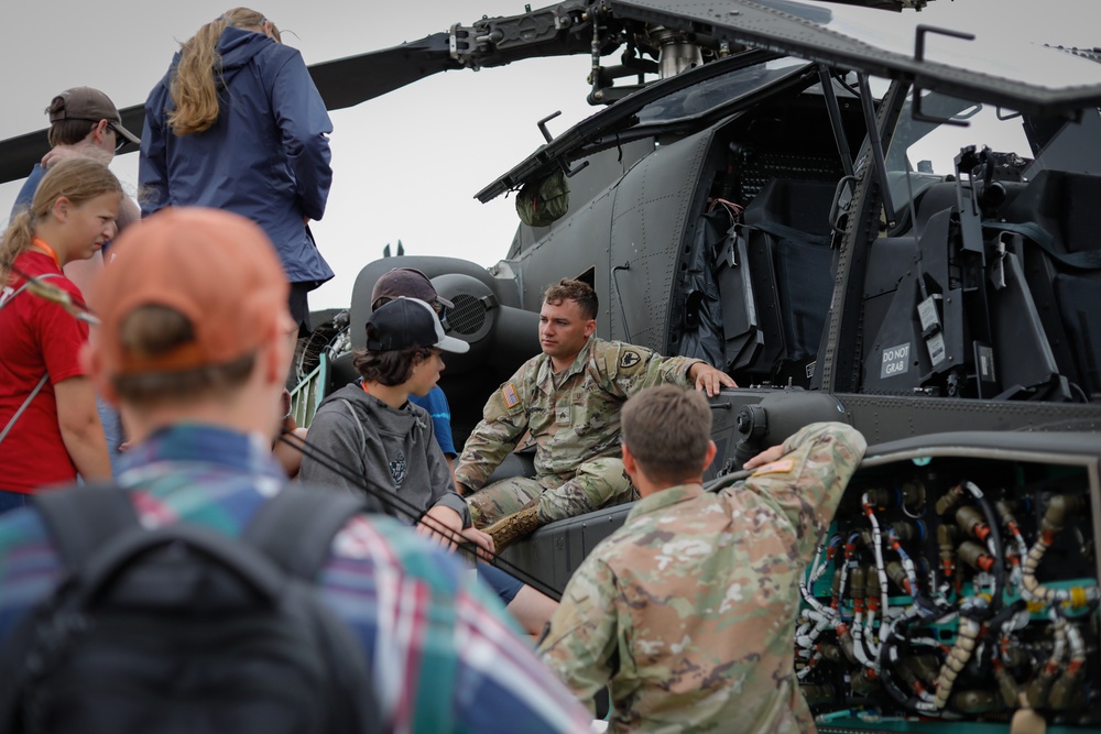 South Carolina Army National Guard helicopter repairers show Apache to youth