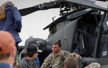 South Carolina Army National Guard helicopter repairers show Apache to youth