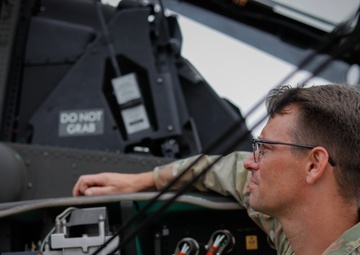 South Carolina Army National Guard helicopter repairers show Apache to youth