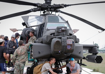 South Carolina Army National Guard helicopter repairers show Apache to youth