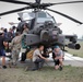 South Carolina Army National Guard helicopter repairers show Apache to youth