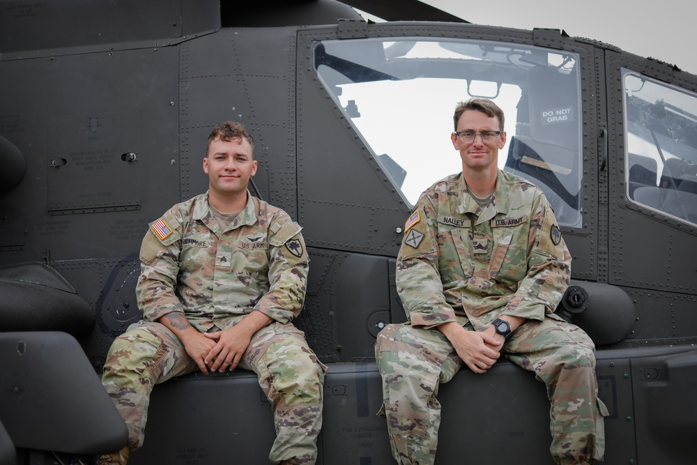 South Carolina Army National Guard helicopter repairers show Apache to youth