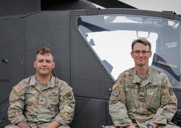 South Carolina Army National Guard helicopter repairers show Apache to youth
