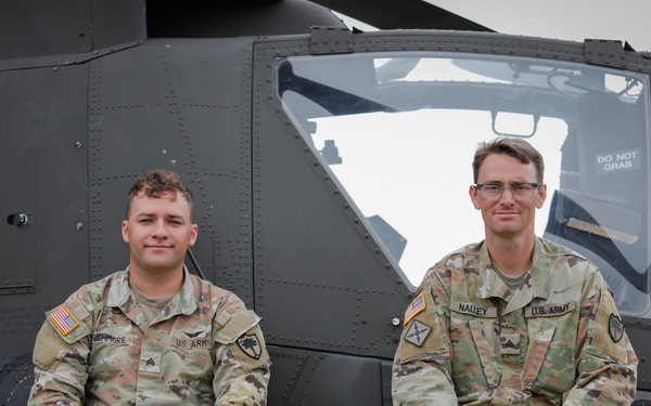 South Carolina Army National Guard helicopter repairers show Apache to youth