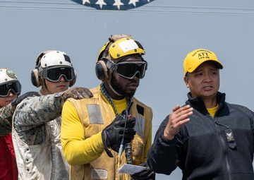 Training team leader guides USS Somerset Sailor during drill