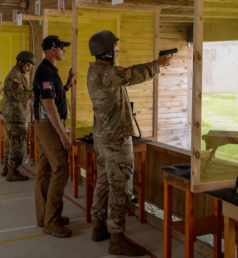 Sgt. 1st Class Kristoffer Friend assists