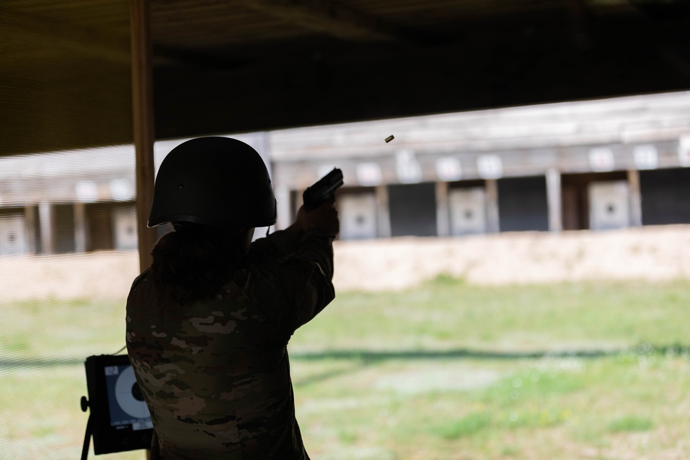 1st Lt. Brianna Mirmina fires a Heckler &amp;amp; Koch USP pistol