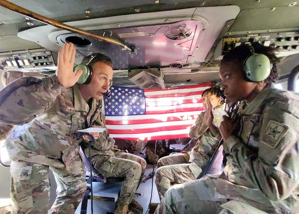 AR-MEDCOM officer administers Army reenlistment oath to Olympic boxer