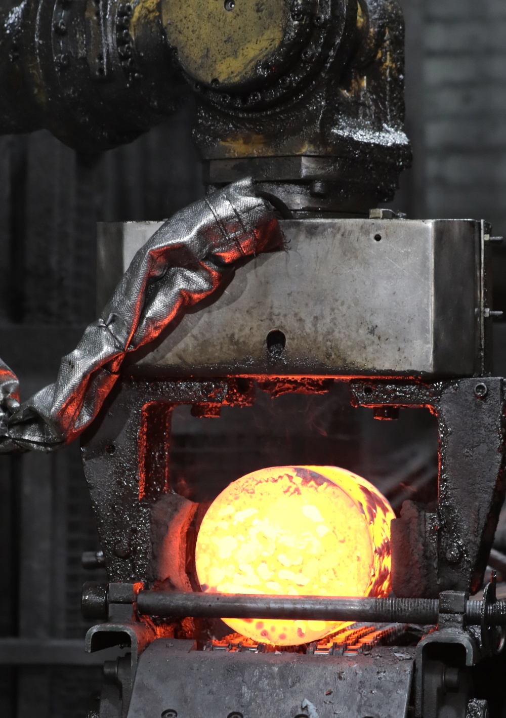 Heated Billet Leaving the Furnace