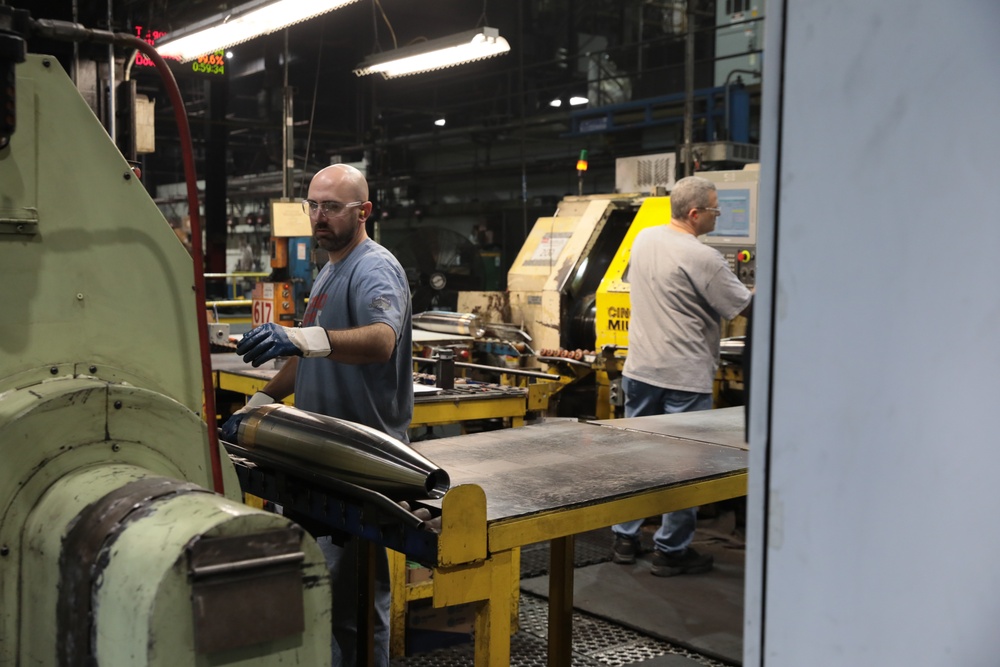 Employees at Scranton Army Ammunition Plant Conduct Finish Turn Process