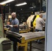 Employees at Scranton Army Ammunition Plant Conduct Finish Turn Process