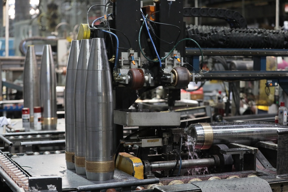 Projectile Cartridge Cases go through Finish Turn Process at Scranton Army Ammunition Plant