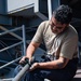 Nimitz Sailor Conducts CIWS Maintenance