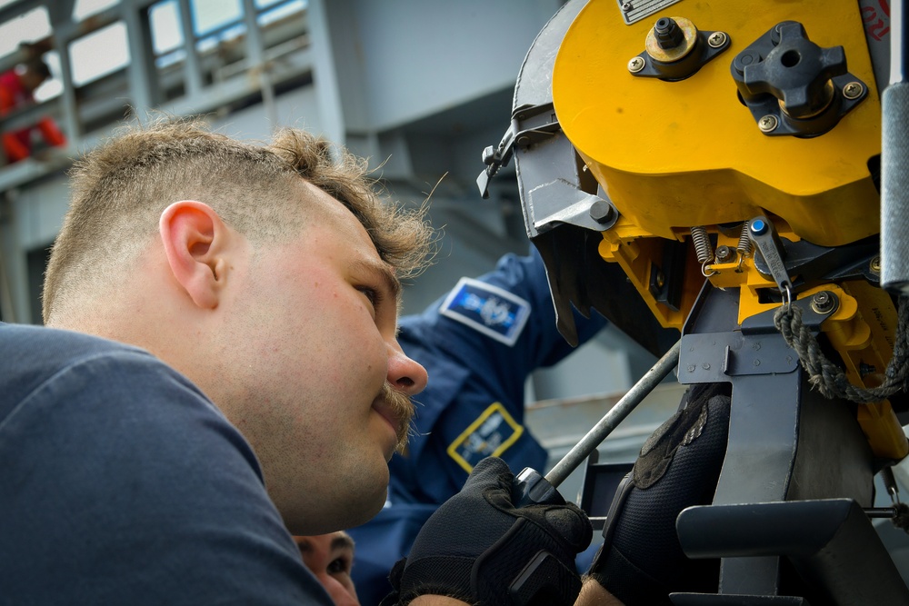 Nimitz Sailors Conduct Maintenance on CIWS