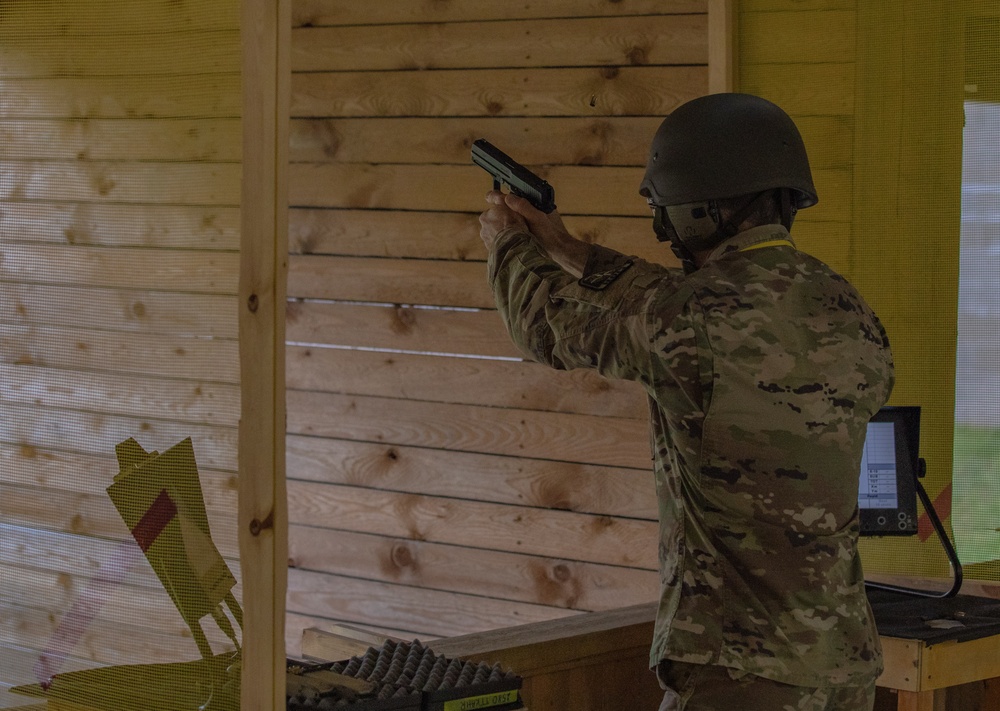 Lt. Col. Thomas Sebastiani shoots a H&amp;K USP 9mm