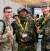 Maj. Sterling Broadhead poses for a picture with fellow competitors