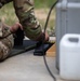 Lt. Col. Thomas Sebastiani loads a LMT R-20 Rahe rifle magazine