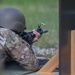 Lt. Col. Thomas Sebastiani shoots a LMT R-20 Rahe rifle