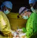 US Army, Burundian surgeons work together in operating room