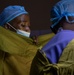 US Army, Burundian surgeons work together in operating room