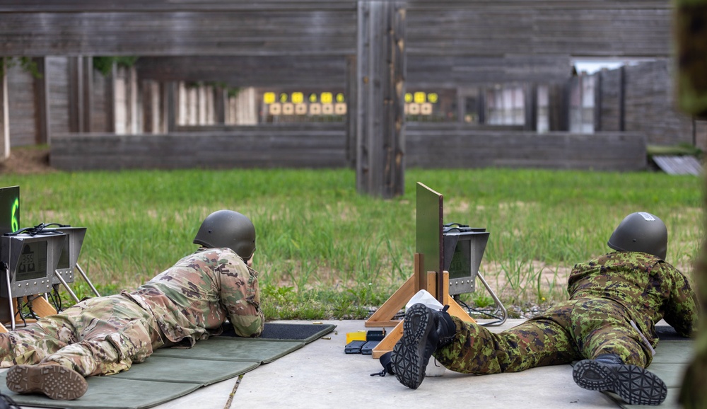 Maj. Sterling Broadhead fires a LMT R20 RAHE